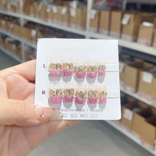 ongles rose et blanc transparent avec strass brillant 